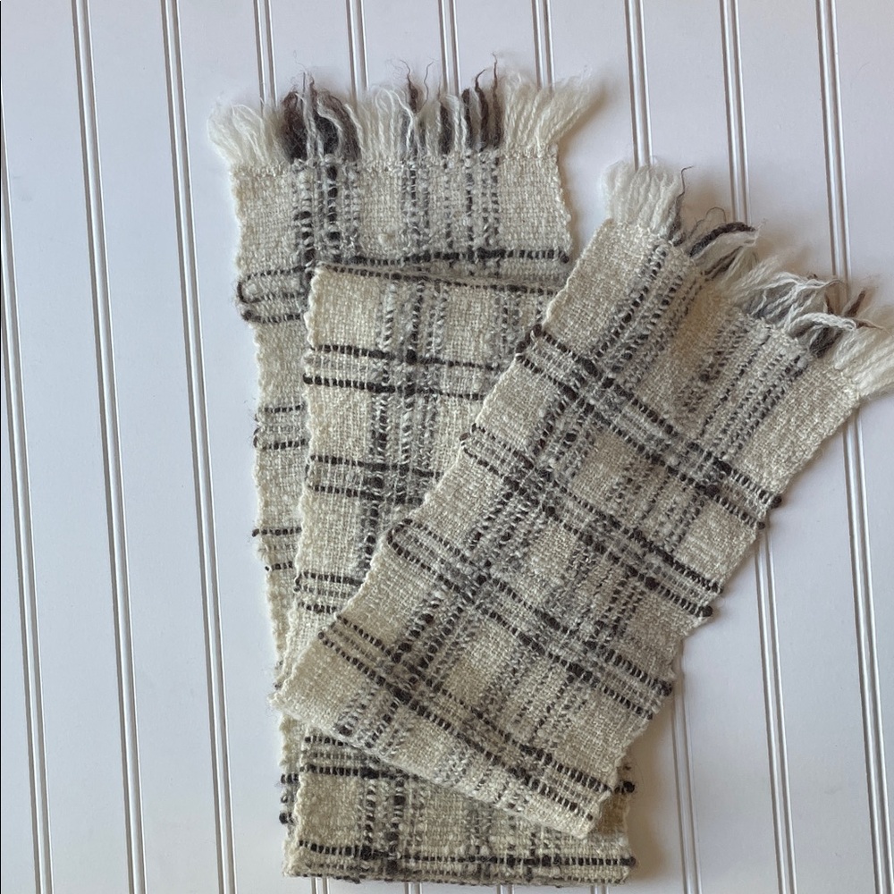 Handwoven 100% wool scarf. Cream and black plaid with fringe.
